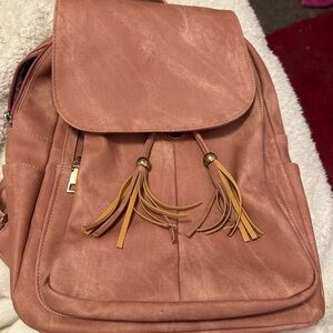 Stylish Pink Backpack with Tassel Accents